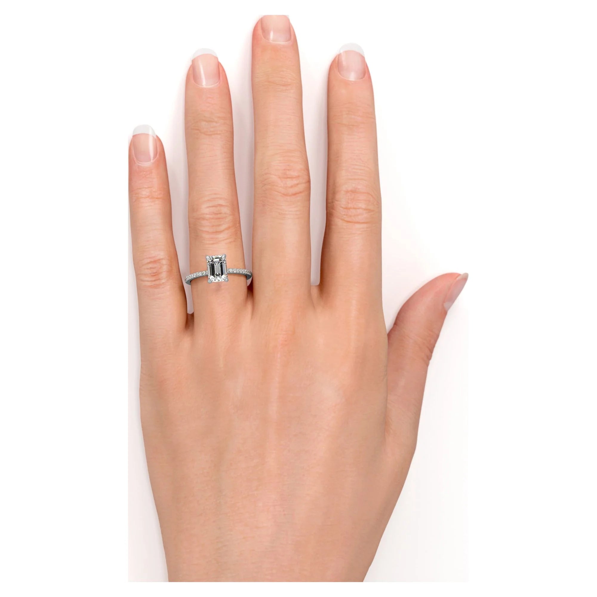 1.25 Carat Emerald Cut Moissanite Solitaire Engagement Ring in 18K White Gold over Silver