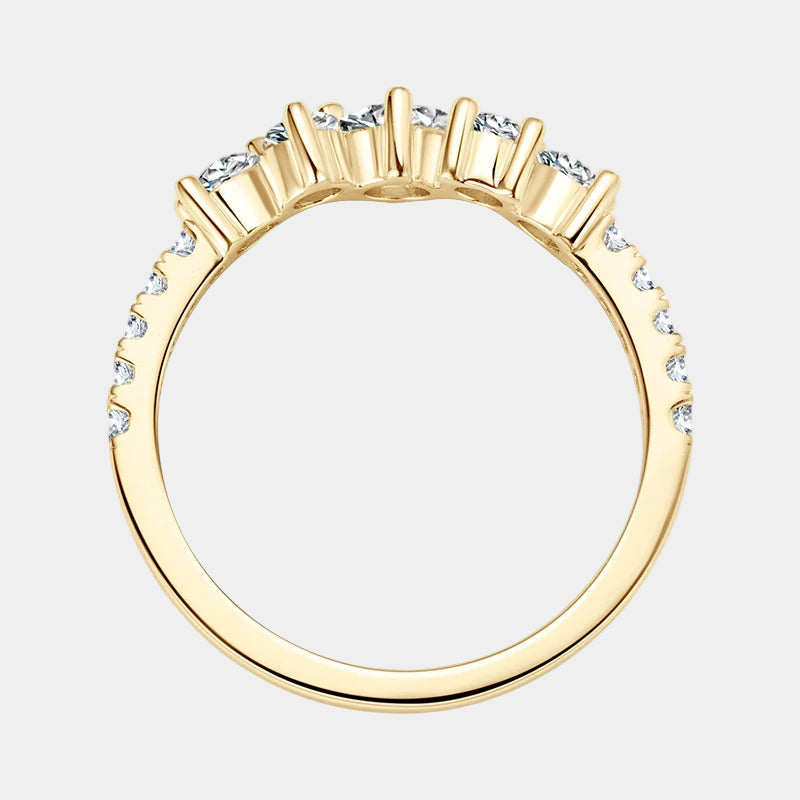 Gold ring with small diamonds on a white background