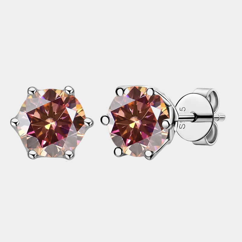 Hexagonal gemstone stud earrings on a white background