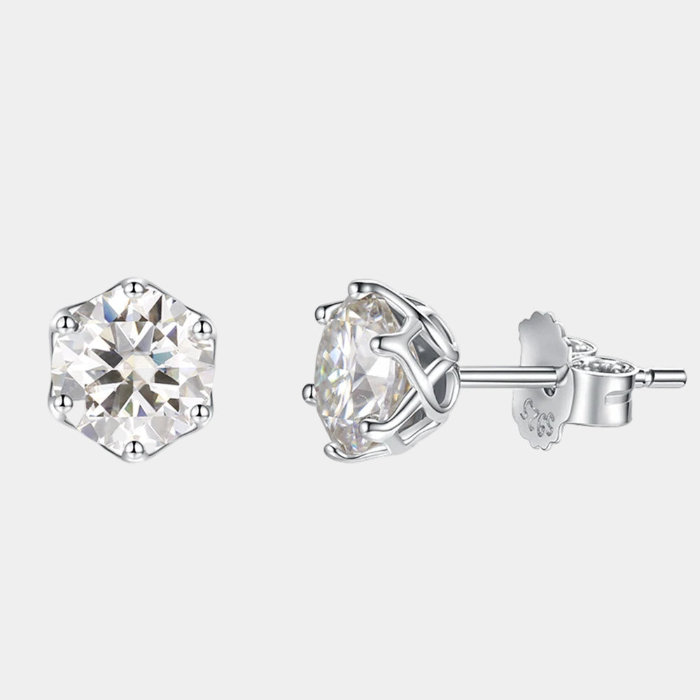 Silver stud earrings with clear gemstones on a white background
