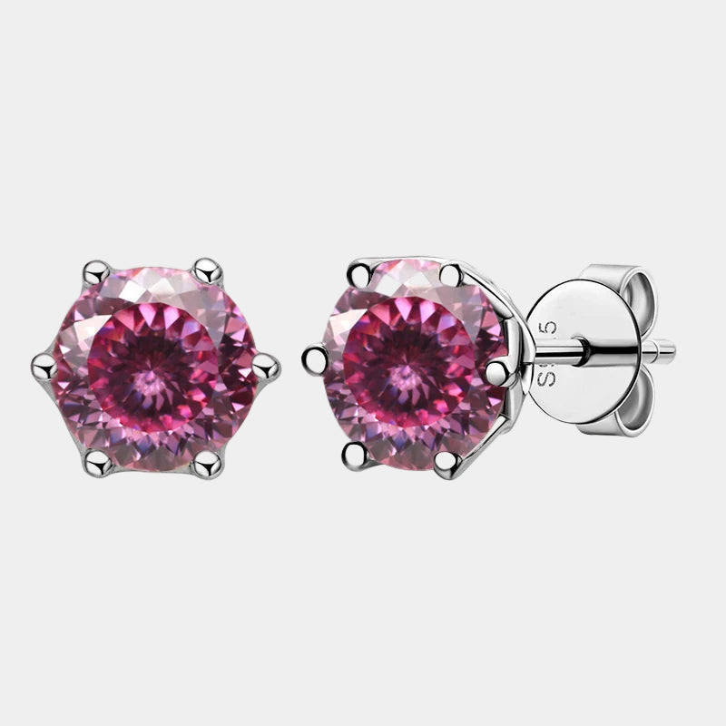 Pair of pink gemstone stud earrings on a white background
