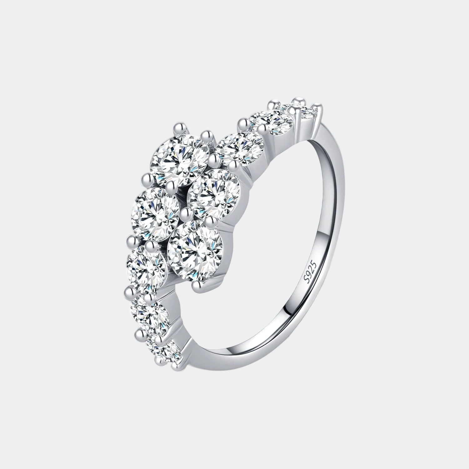 Silver ring with diamond accents on a white background
