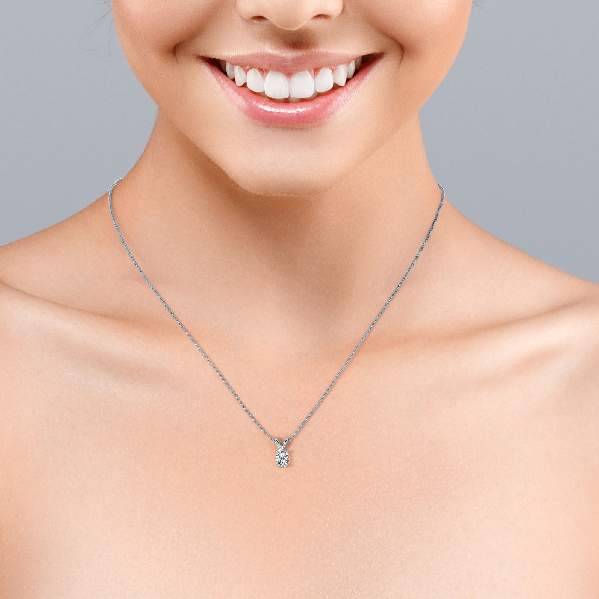 Enchanting 1 Carat Oval Shaped Moissanite Pendant Necklace in 18K White Gold Plating over Silver